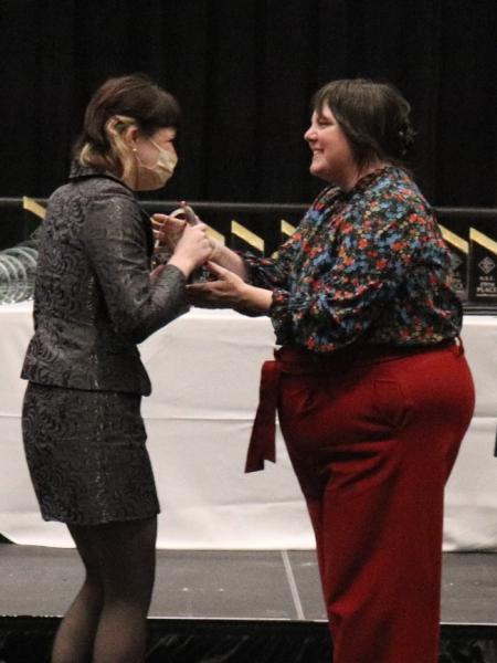 Photo of student receiving award for Dramatic Interpretation