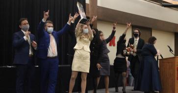 Photo of Texas Speech winning award