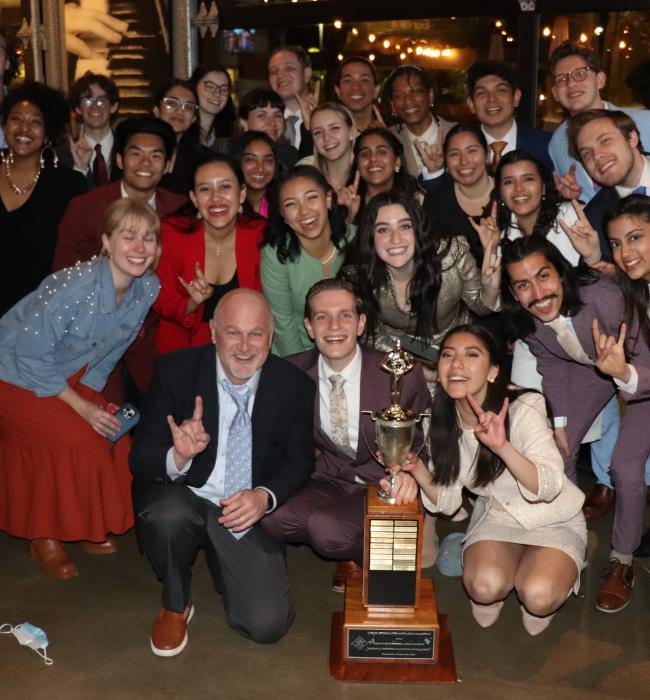 Photo of Texas Speech team after being awarded the 2023 championship