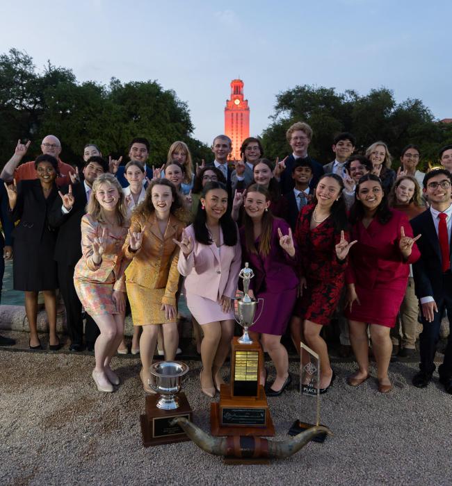 speech team in front of tower