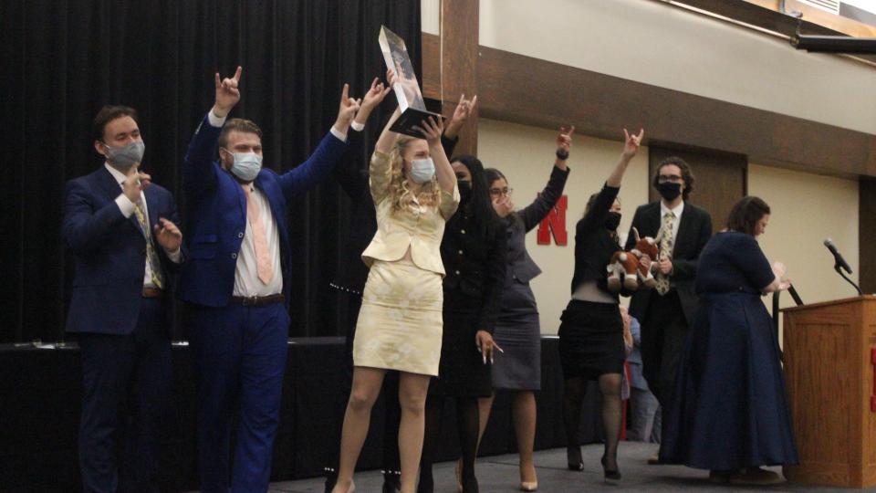 Photo of Texas Speech winning award