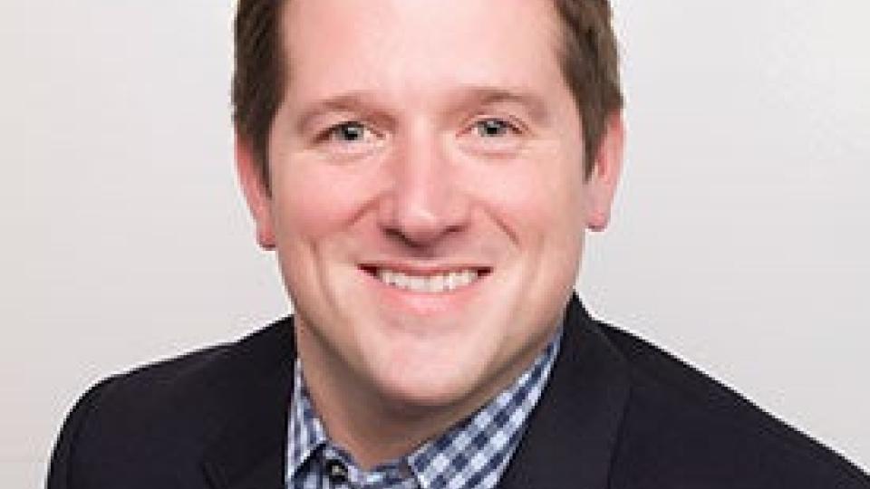 Headshot of Reid Whitaker