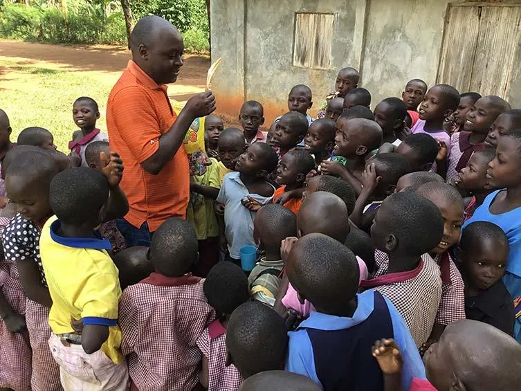 Doctoral Student Fred Jenga with his students