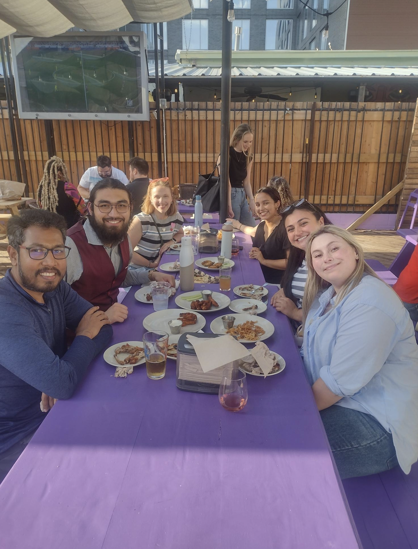 CMS grad students smiling.