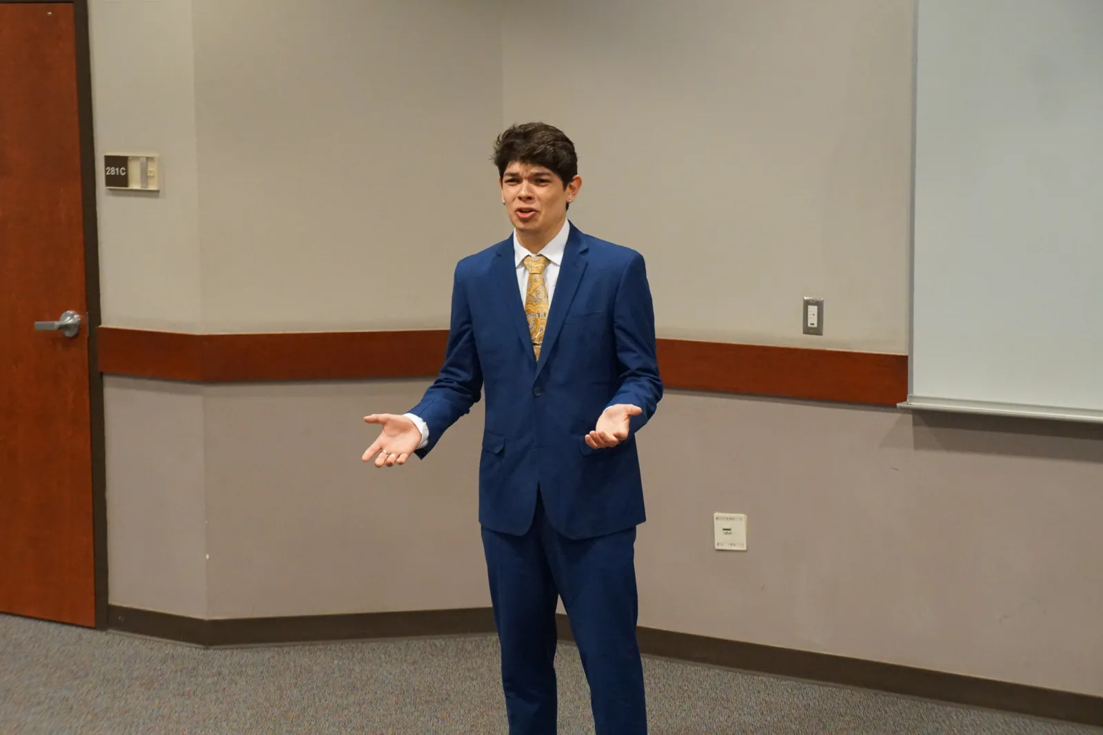 Student giving information speech.