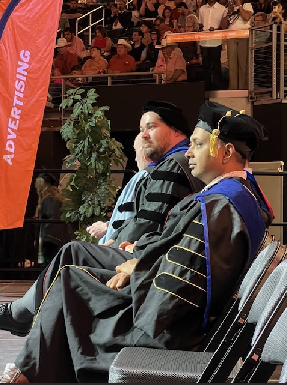 CMS faculty Brendan Bankey and Shiv Ganesh on the 2025 Commencement stage.