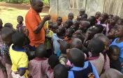 Doctoral Student Fred Jenga with his students