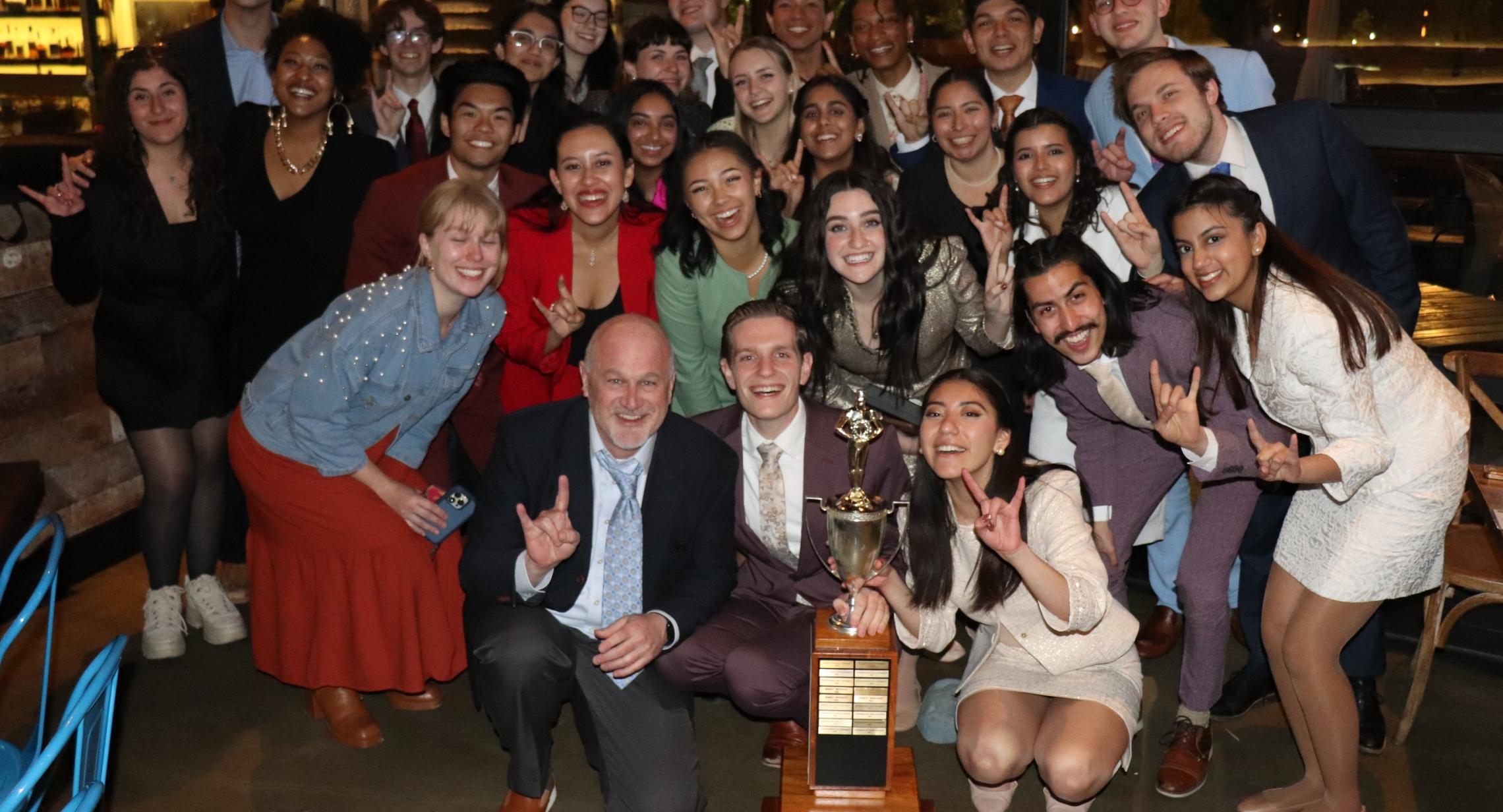 Photo of Texas Speech team after being awarded the 2023 championship