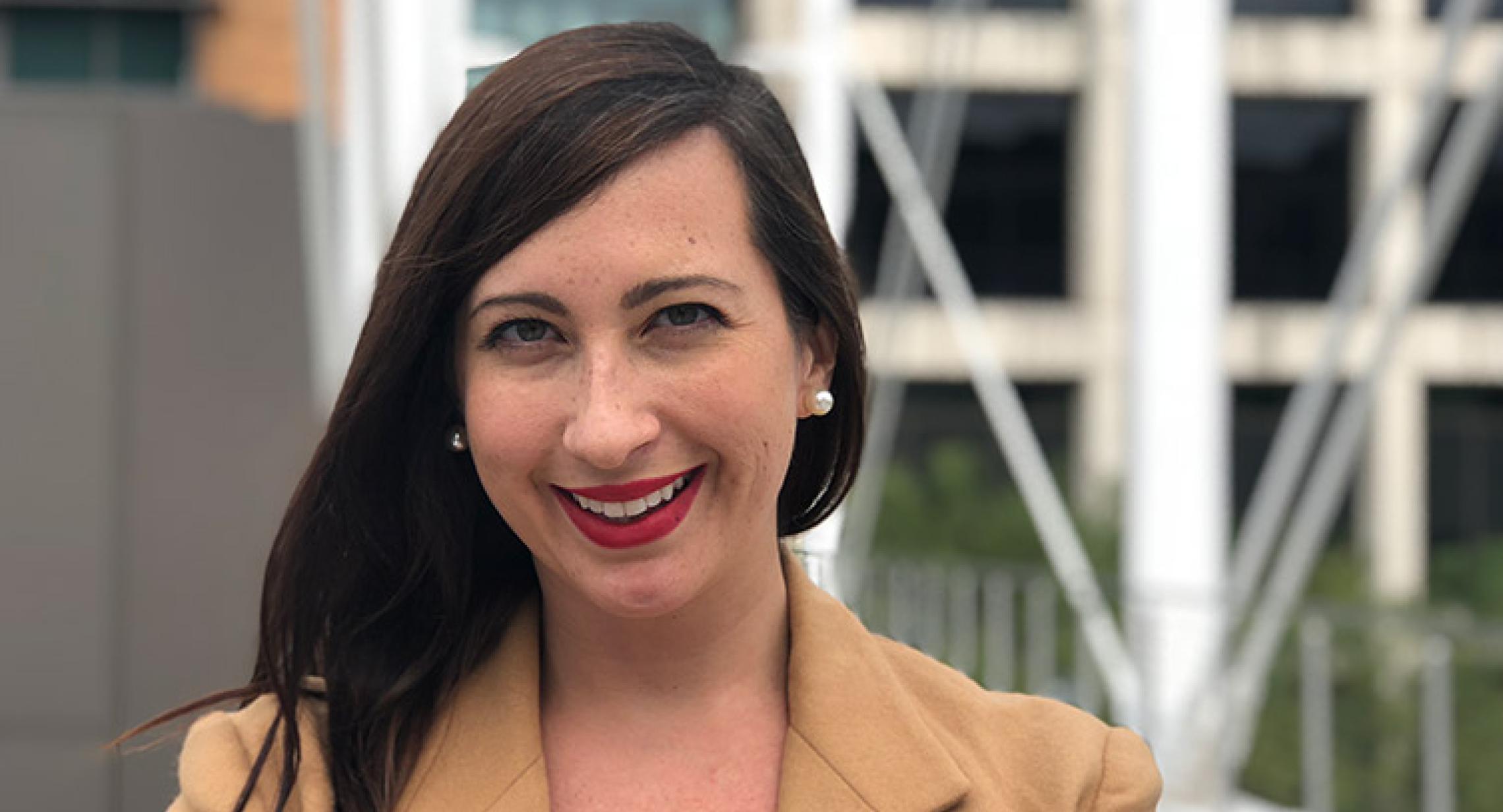 Graduate student Billy Table standing outside