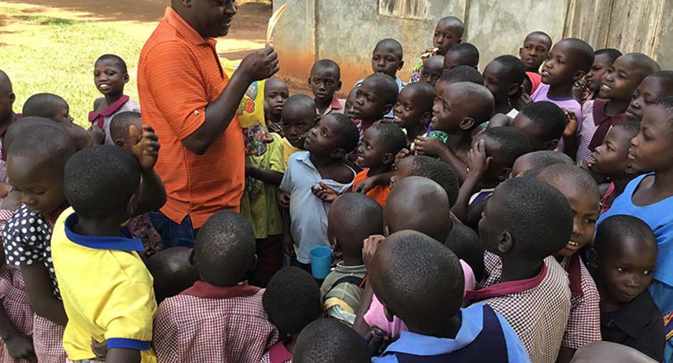 Doctoral Student Fred Jenga with his students